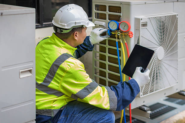 Professional Heat Pump Repair technician working in Greenfield, IN